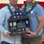 Dave Little, left, one of 14 firefighters who recently retired from Puget Sound Fire and honored by Fire Chief Brian Carson, right, at a Sept. 29 ceremony at the Kent Senior Center. COURTESY PHOTO, Puget Sound Fire