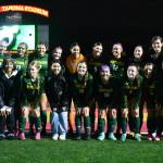 Team photo after the win against Rogers. Ben Ray / The Reporter