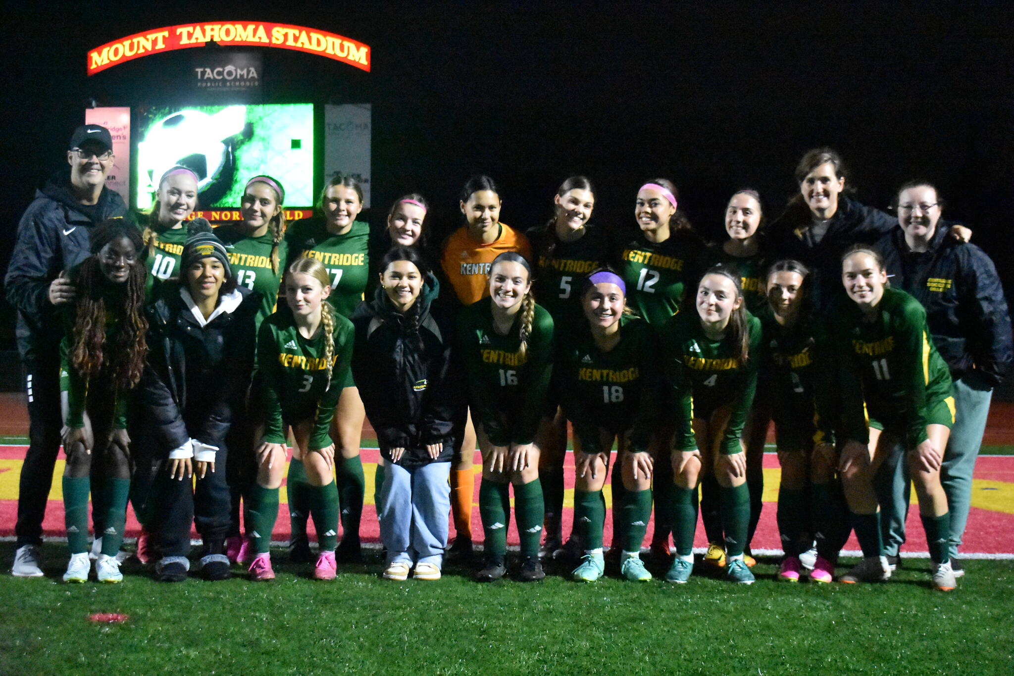 Team photo after the win against Rogers. Ben Ray / The Reporter