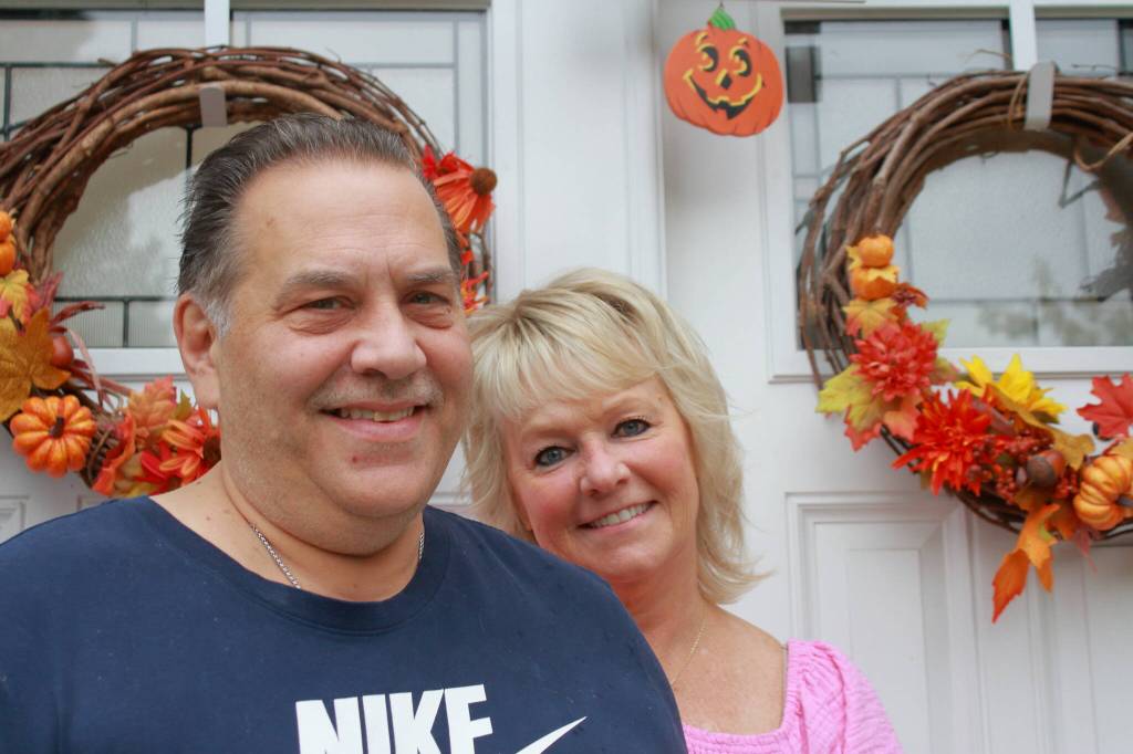 Dale and Denise Pac at their home. Photo by Keelin Everly-Lang / The Mirror