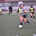 Hayden Rallo controls the ball at Kentlake practice. Ben Ray / The Reporter