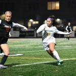 Lauren Covello gets ready to lunge for a challenge. Ben Ray / The Reporter