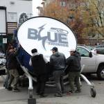 A whole crew of Seattle Seahawks staff were needed to lift the drum. (Cameron Sheppard/Sound Publishing)