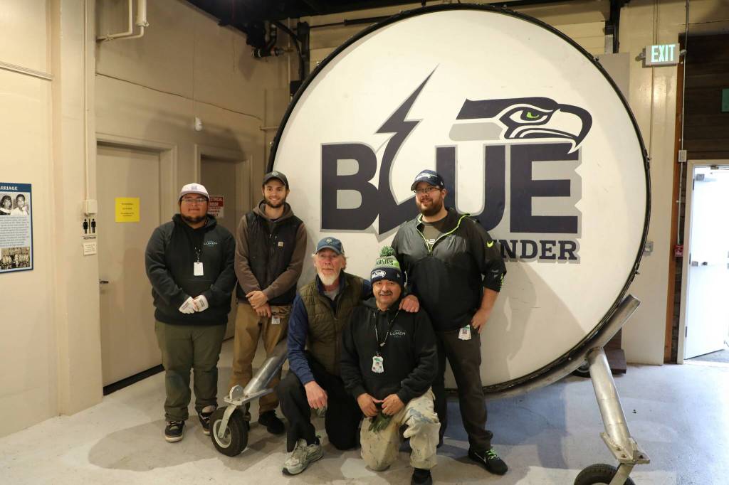 Cameron Sheppard/Sound Publishing
The crew celebrates the bass drums new home in the Renton History Museum.