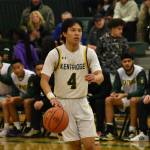 Aidan Flores brings the basketball up the floor for Kentridge. Ben Ray / The Reporter