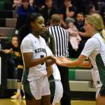 Ajayi and Boris high five after a foul by a Tahoma player. Ben Ray / The Reporter
