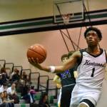 Corey Tita goes up for a layup against Tahoma. Ben Ray / The Reporter