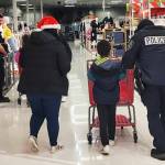 A child goes shopping at Target as part of the Kent Police Departments Shop with a Cop. COURTESY PHOTO, Kent Police