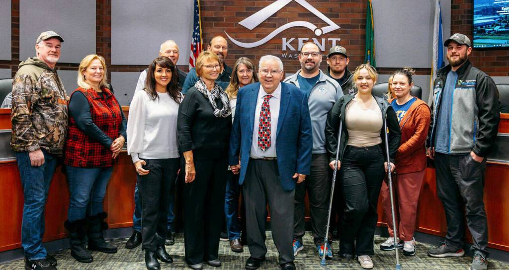 City Councilmember Les Thomas poses with his family Dec. 12 at his final meeting. COURTESY PHOTO, City of Kent