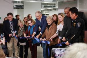 Local leaders help cut the ribbon at the Federal Way toxicology lab opening event. From left to right: Mayor Jim Ferrell, State Sen. Claire Wilson, Deputy Mayor Susan Honda, Gov. Jay Inslee, Council President Linda Kochmar, Dr. Fiona Couper, director of the Forensic Laboratory Services Bureau, WSP Chief John Batiste and Federal Way Police Chief Andy Hwang. Photo by Keelin Everly-Lang / The Reporter
