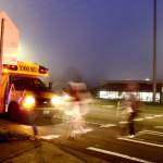 School bus routes go through the busy intersection of 308th Street and Pacific Highway South in front of Federal Way High School on Dec. 18. Students are advocating for changes to these routes to protect pedestrians heading to school. (Photo by Keelin Everly-Lang / Sound Publishing)