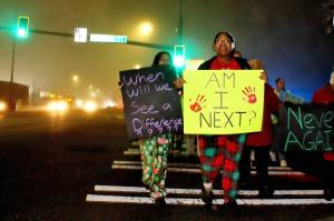 Students hold signs sharing their fear of being the next victim of a vehicle / pedestrian collision as they walk to school Dec. 18. Photo by Keelin Everly-Lang / Sound Publishing
Students hold signs sharing their fear of being the next victim of a vehicle / pedestrian collision as they walk to school Dec. 18. Photo by Keelin Everly-Lang / The Mirror