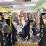 Volunteers gather to help clean up water damage at Page Turner Books in downtown Kent from pipes that bursted after the sub-freezing temperatures. COURTESY PHOTO, Page Turner Books