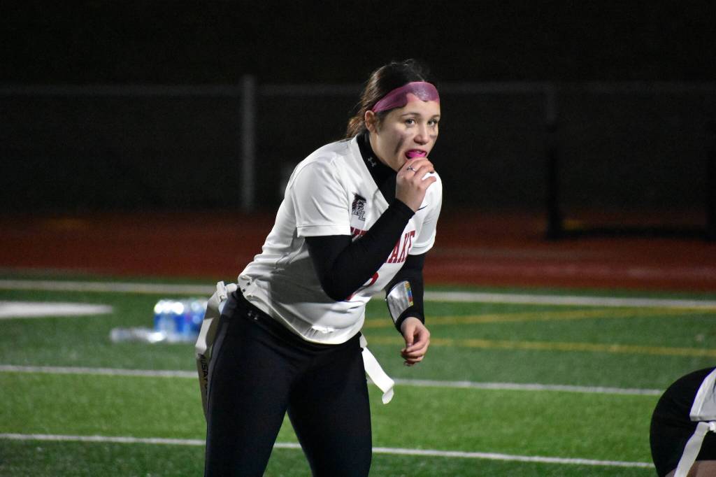 Kentlake Jr. Quarterback Jasmine Demecillio prepares to take the snap.
