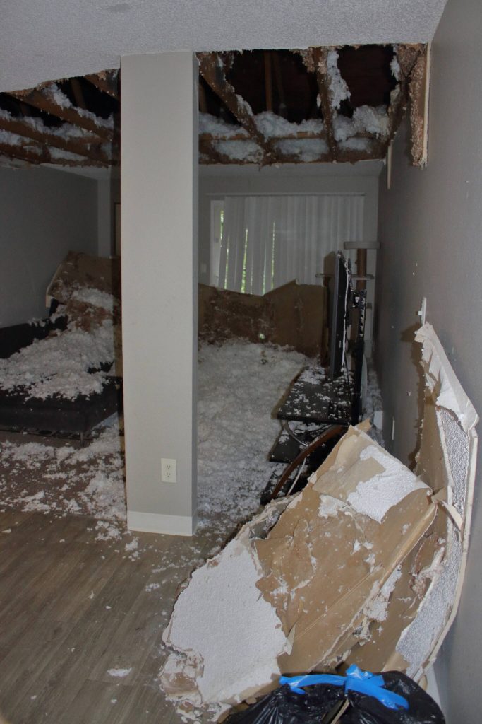 Pieces of ceiling and insulation still cover Katherine Blinkovas apartment on Jan. 26 after pipes burst on Jan. 14. (Photo by Keelin Everly-Lang/The Mirror)