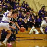Blake Stempniak driving to the rack with a Sumner Spartan defending him on the perimeter. Ben Ray / The Reporter