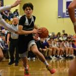 Sophomore Brandon Tagle drives to the hoop in the second half. Ben Ray / The Reporter