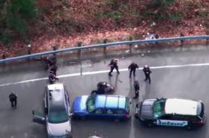 A screenshot of the King County Sheriffs Office Guardian One helicopter view of the arrest of a Kent man after carjacking incidents Feb. 13 in Kent. COURTESY IMAGE, King County Sheriffs Office
