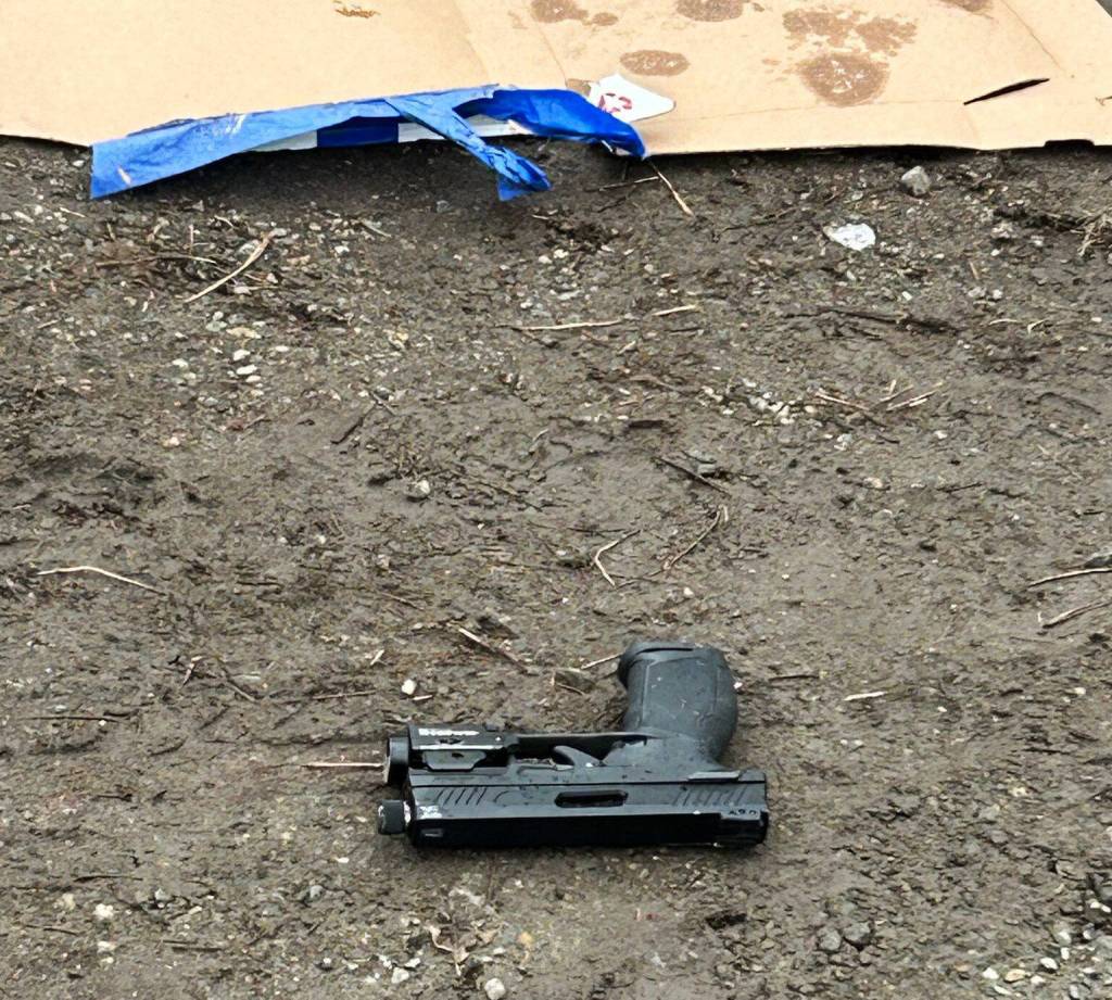 A handgun found on the property of an alleged chop shop in Kent. COURTESY PHOTO, Kent Police