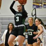 Freshman Tyanna Sims takes a mid-range jump shot against Eastlake. Ben Ray / The Reporter