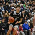 Brandon Tagle pulls up for a three pointer in transition. Ben Ray / The Reporter