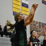 Niki Boris takes a three pointer at Issaquah High School in the regional playoff round. Ben Ray / The Reporter