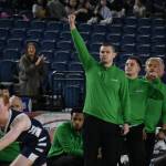 Kentwood HC Blake Solomon holds his arm in the air in celebration after beating Olympia. Ben Ray / The Reporter