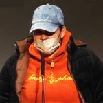 A woman testifies March 5 in Seattle at a King County committee meeting to seek housing support at a Kent hotel. Screenshot via King County TV