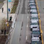 Police cars stop along Marine View Drive during a memorial procession for Washington State Trooper Christopher Gadd on Tuesday, March 12, 2024 in Everett, Washington. (Olivia Vanni / The Herald)