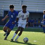 Keilor Cacho-Garcia possesses the ball in the first half against the Eagles. Ben Ray / The Reporter