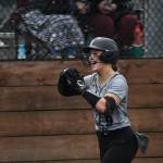 Sarah Wright gives a big smile after her home run. Ben Ray / The Reporter