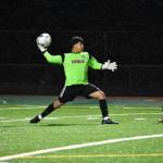 Manny Sanjuan throws the ball to a teammate against Auburn. Ben Ray / The Reporter