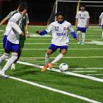 Johan Zuluaga controls the ball against the Trojans at Auburn Memorial. Ben Ray / The Reporter