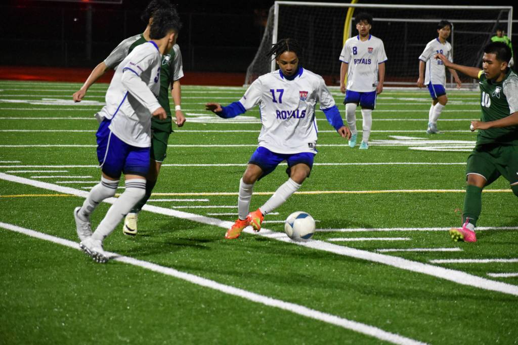 Johan Zuluaga controls the ball against the Trojans at Auburn Memorial. Ben Ray / The Reporter