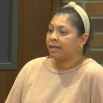 An asylum seeker asks the Kent City Council for housing help at the April 16 meeting. Screenshot via City of Kent