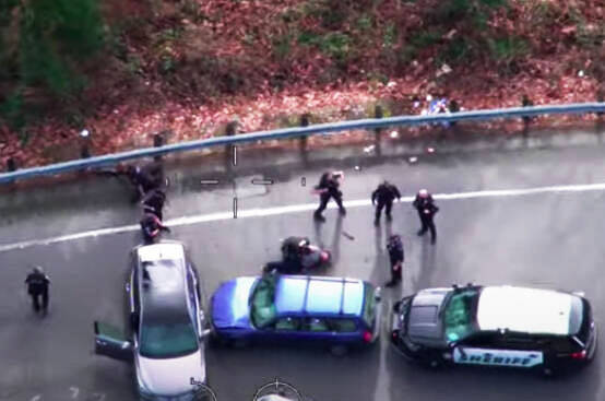 A screenshot of the King County Sheriffs Office Guardian One helicopter view of the arrest of a Kent man after carjacking incidents Feb. 13 in Kent. COURTESY IMAGE, King County Sheriffs Office