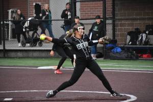 Sarah Wright does her thing in the circle for Kentwood. Ben Ray / The Reporter