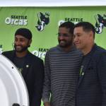 Harmeet Singh (right) and Ross Taylor (left) take a photo with a fan at fan fest. Ben Ray / The Reporter