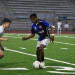 Keilor Cacho Garcia takes on a Stadium defender. Ben Ray / The Reporter