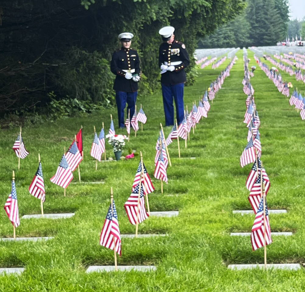 Two Marines pay their respects at Tahoma National Cemetery. COURTESY PHOTO, Tahoma National Cemetery