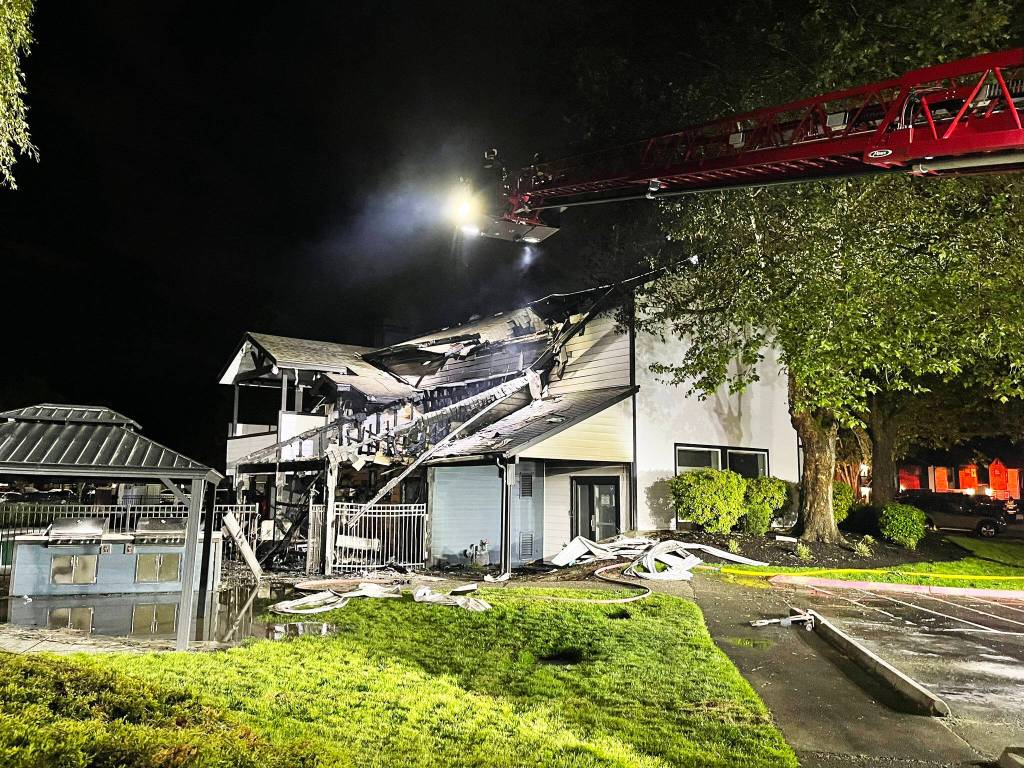 A portion of the roof of the apartment complex leasing office building collapsed during the fire. COURTESY PHOTO, Puget Sound Fire