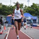 Kentridges LaJaya Brown does her run up for the long jump at state. Ben Ray / The Reporter
