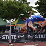 Hazens Illia Biezak leaps over the bar. Ben Ray / The Reporter