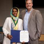 Shamso Issak, of Kent, receives King Countys Martin Luther King Jr. Distinguished Service Award from County Councilmember Dave Upthegrove June 4 at the Council chambers in Seattle. COURTESY PHOTO, King County