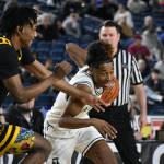 Photos by Ben Ray / The Reporter
Jaylen Petty drives against Lincoln inside the Tacoma Dome.