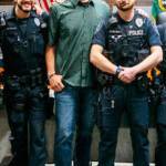 Washington State Patrol Trooper Raymond Seaburg, in the green shirt, at a recent event to honor the Kent Police officers who came to his aid. COURTESY PHOTO, Kent Police