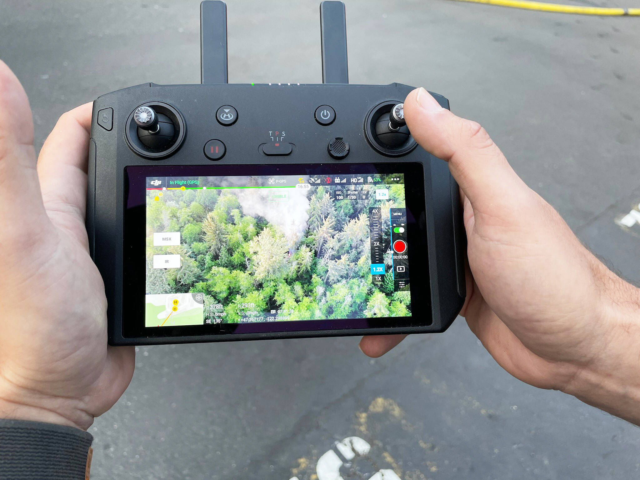 A Kent Police drone helps Puget Sound Fire track a brush fire in the woods Friday, July 12 in the 25900 block of 27th Place South on the West Hill. COURTESY PHOTO, Puget Sound Fire