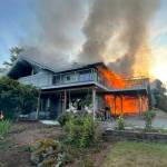 Fire races through a house Saturday, Aug. 3 in the 24300 block of 138th Avenue SE in Kent. COURTESY PHOTO, Puget Sound Fire