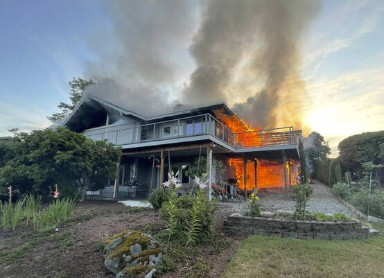 Fire races through a house Saturday, Aug. 3 in the 24300 block of 138th Avenue SE in Kent. COURTESY PHOTO, Puget Sound Fire