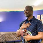 Quinton Morris receives the Delta Community Captain award from the Seattle Seahawks and Delta Air Lines. Photo by Edwin Hooper/Seattle Seahawks